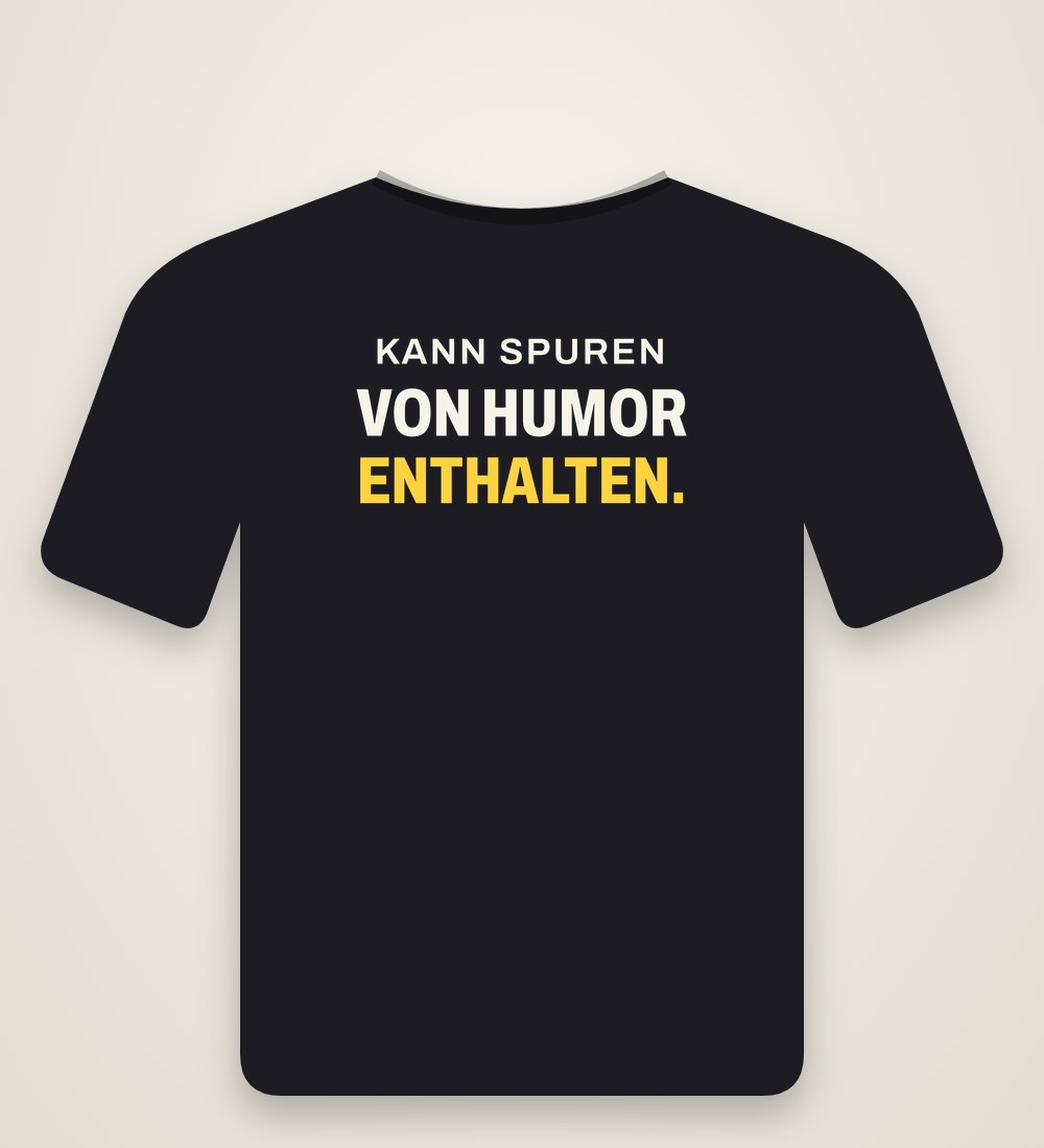 T-Shirt „Kann Spuren von Humor enthalten.“